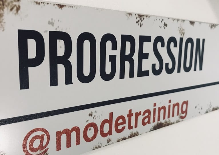 Progression sign at Mode Training