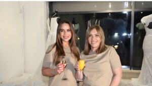 2 females with glass champagne